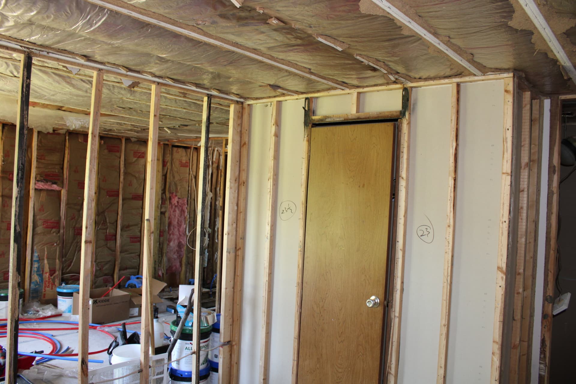 New doorway framing beneath an insulated ceiling